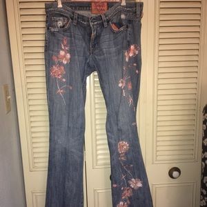 Guess Premium distressed, pink flower jeans. 30x30